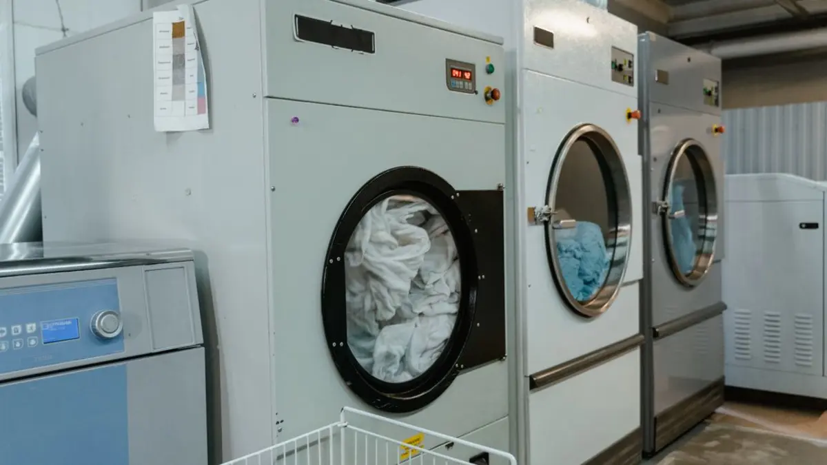 Activated alumina regeneration in dryer bed with heating coils and gas distribution